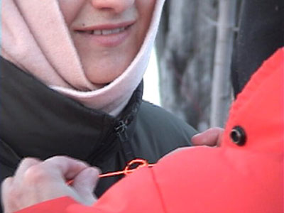 tourangeau attaching string to audience member